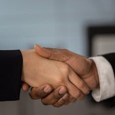 Close-up of a professional handshake symbolizing business partnership and agreement.
